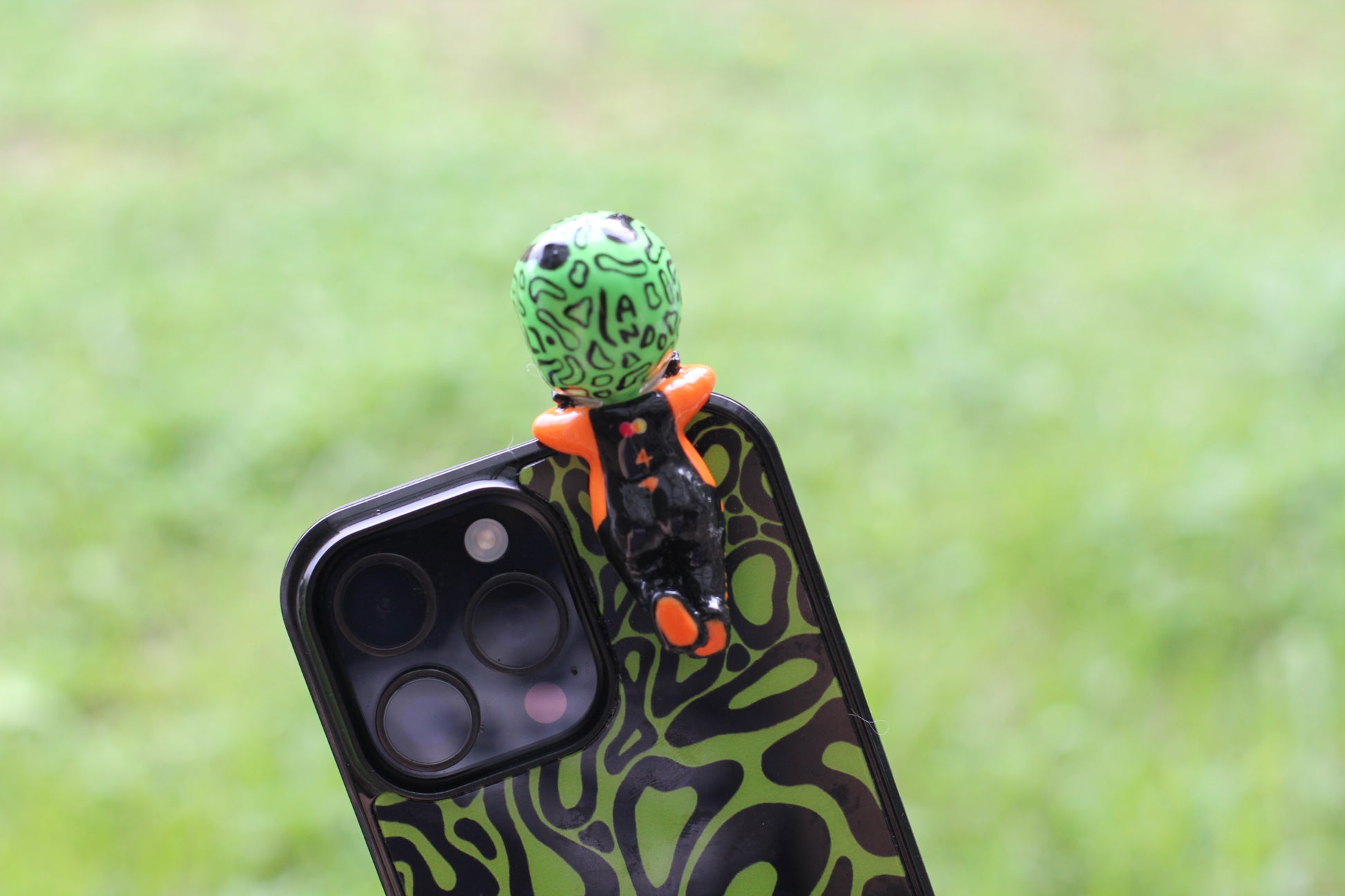Lando Norris sonny angel attached to phone 